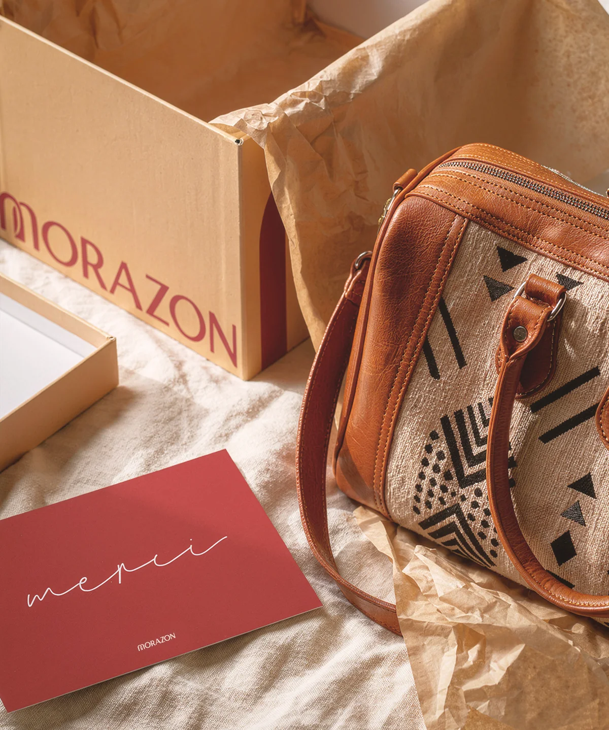 Morazon leather bag, packaging, and authenticity card