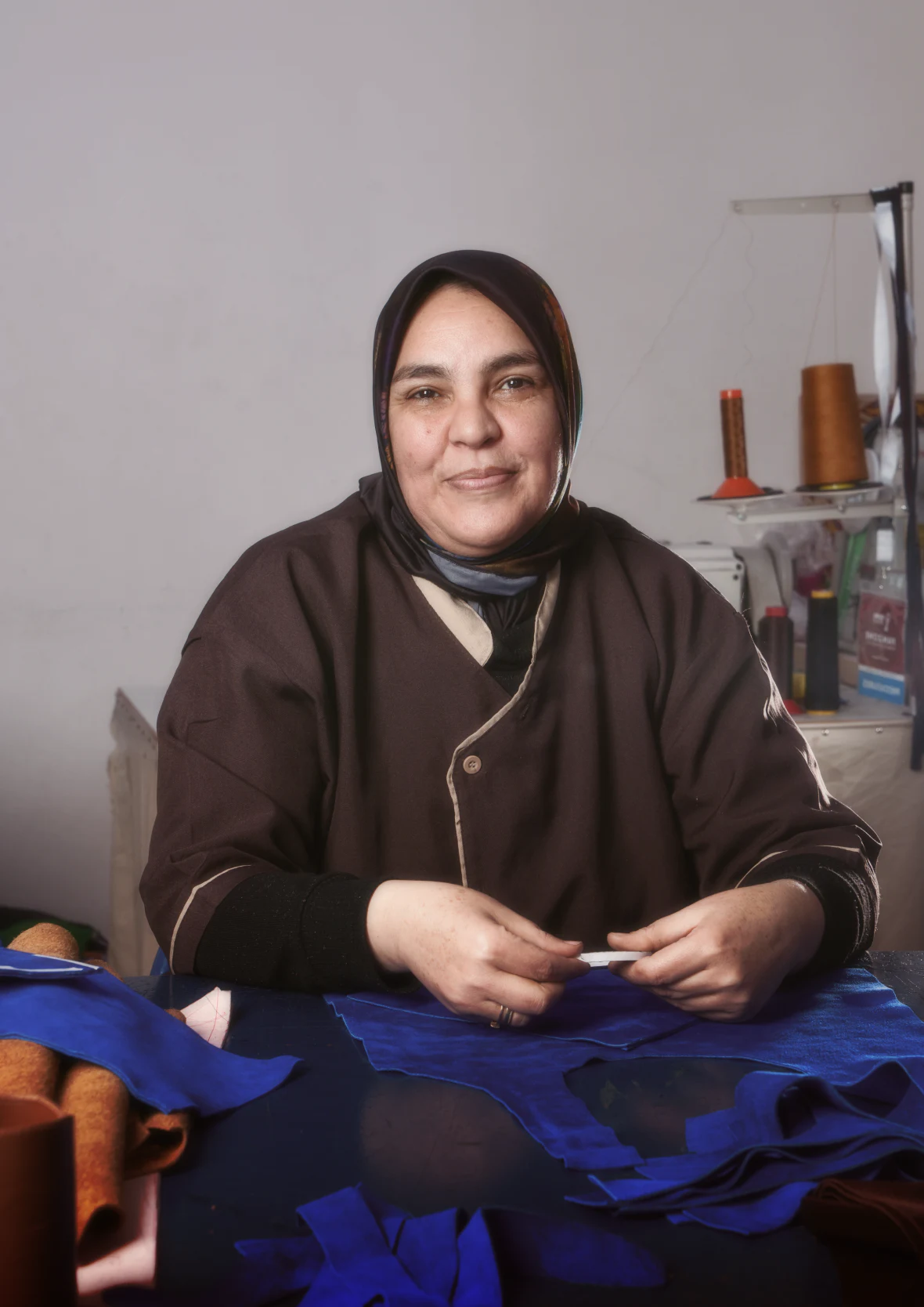 Leather artisan in her workshop in Morocco